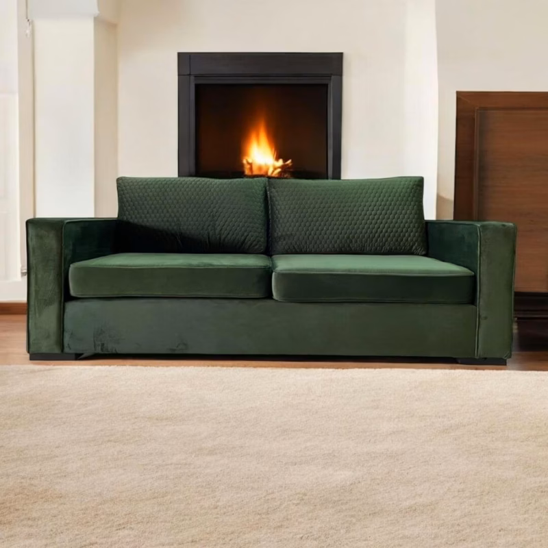 Charlston Ivy Green Couch front view with fireplace backdrop